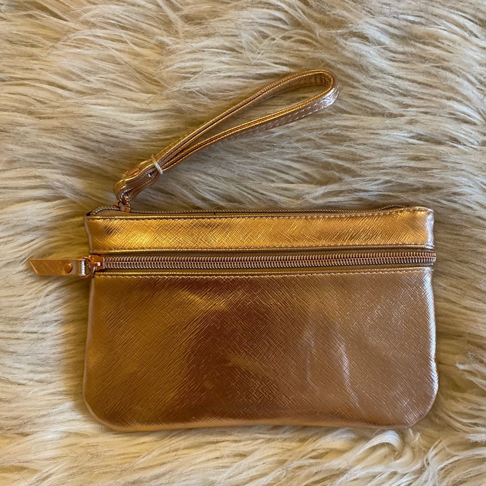 H&M rose gold clutch with usb and iPhone charger